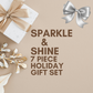 Promotional image of a 'Sparkle & Shine 7 Piece Holiday Gift Set' with decorative elements on a beige background.